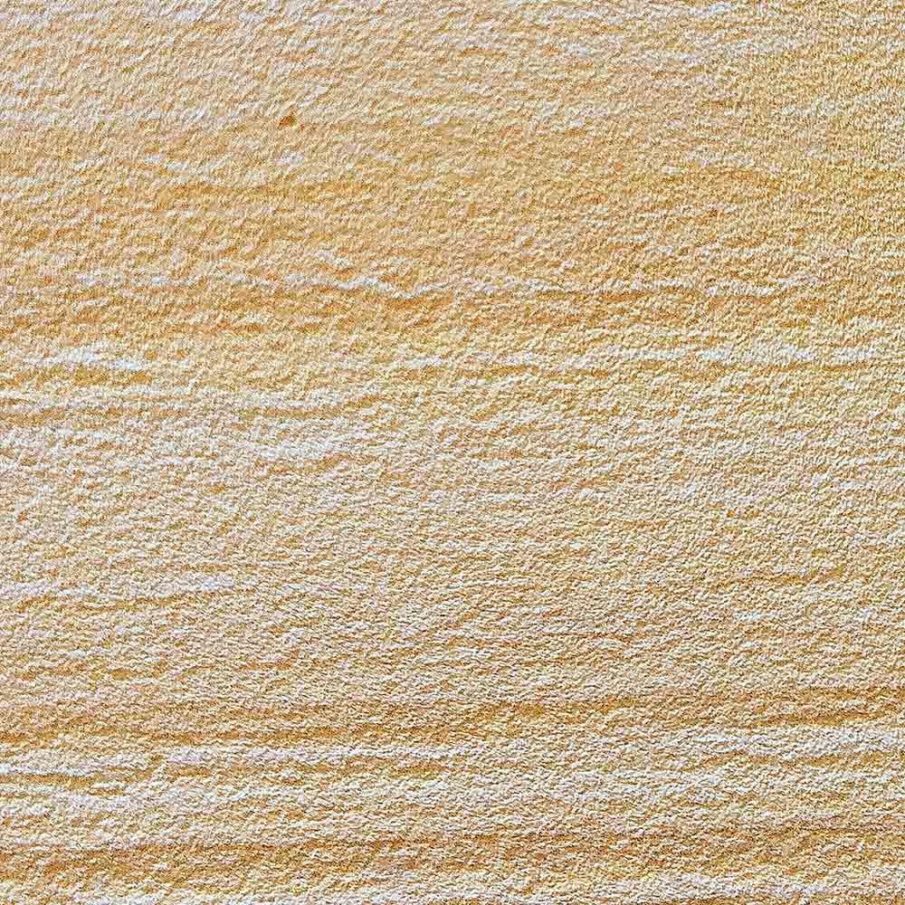 Bush-hammered textured stone finish